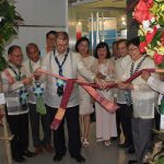 Sec. De La Pena and Engr. Rowen Gelonga with the different SUC Presidents untie the ribbon to formally open the exhibits.